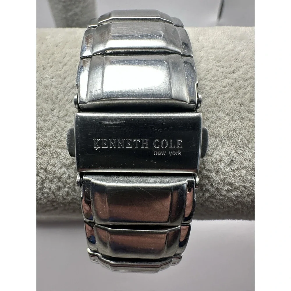 Kenneth Cole it showing